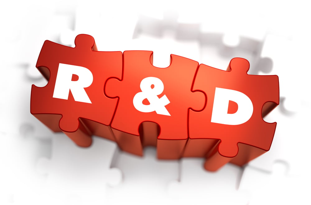 Research and Development - White Word on Red Puzzles on White Background. 3D Render.